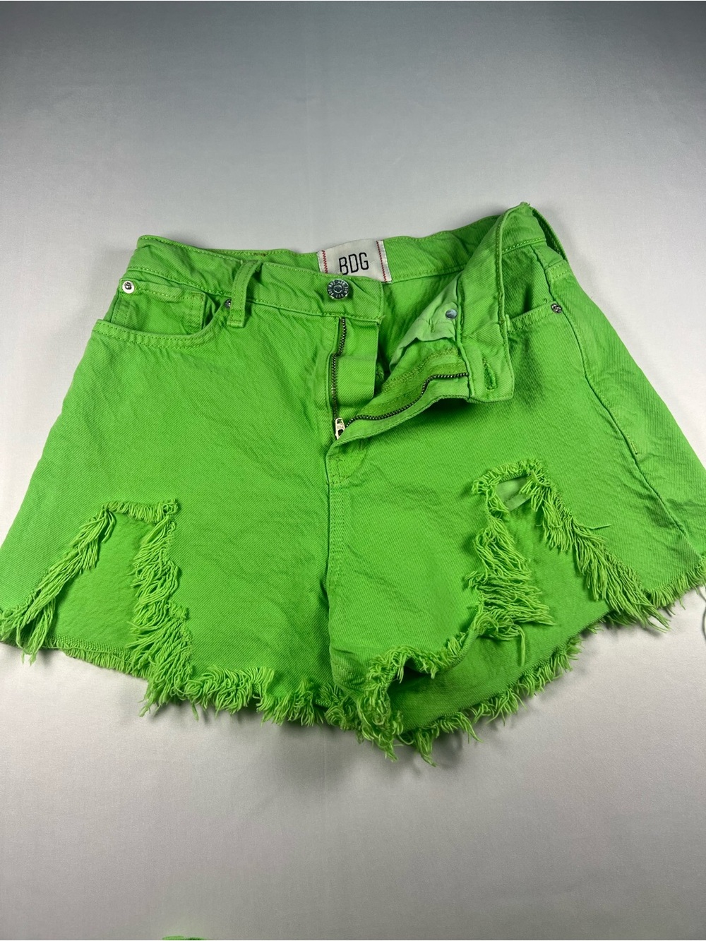 BDG Neon Green Distressed Denim Shorts